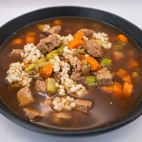 Beef and barley soup plated 500x500