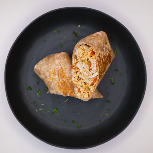 Chicken fajita burrito plated 500x500
