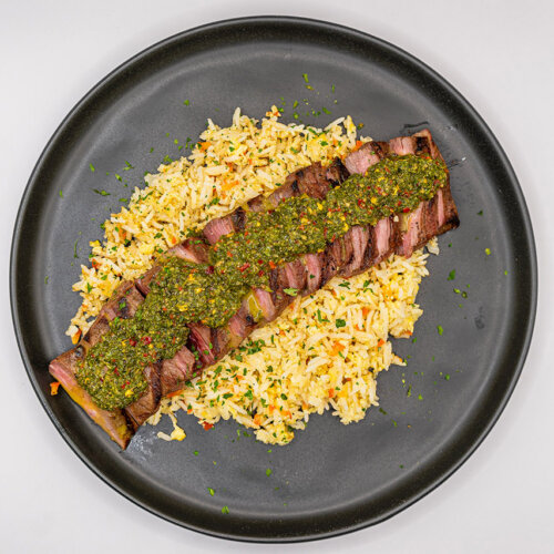 Chimichurri steak with fried rice plated 2 500x500