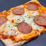 Turkey pepperoni flatbread pizza plated 150x150